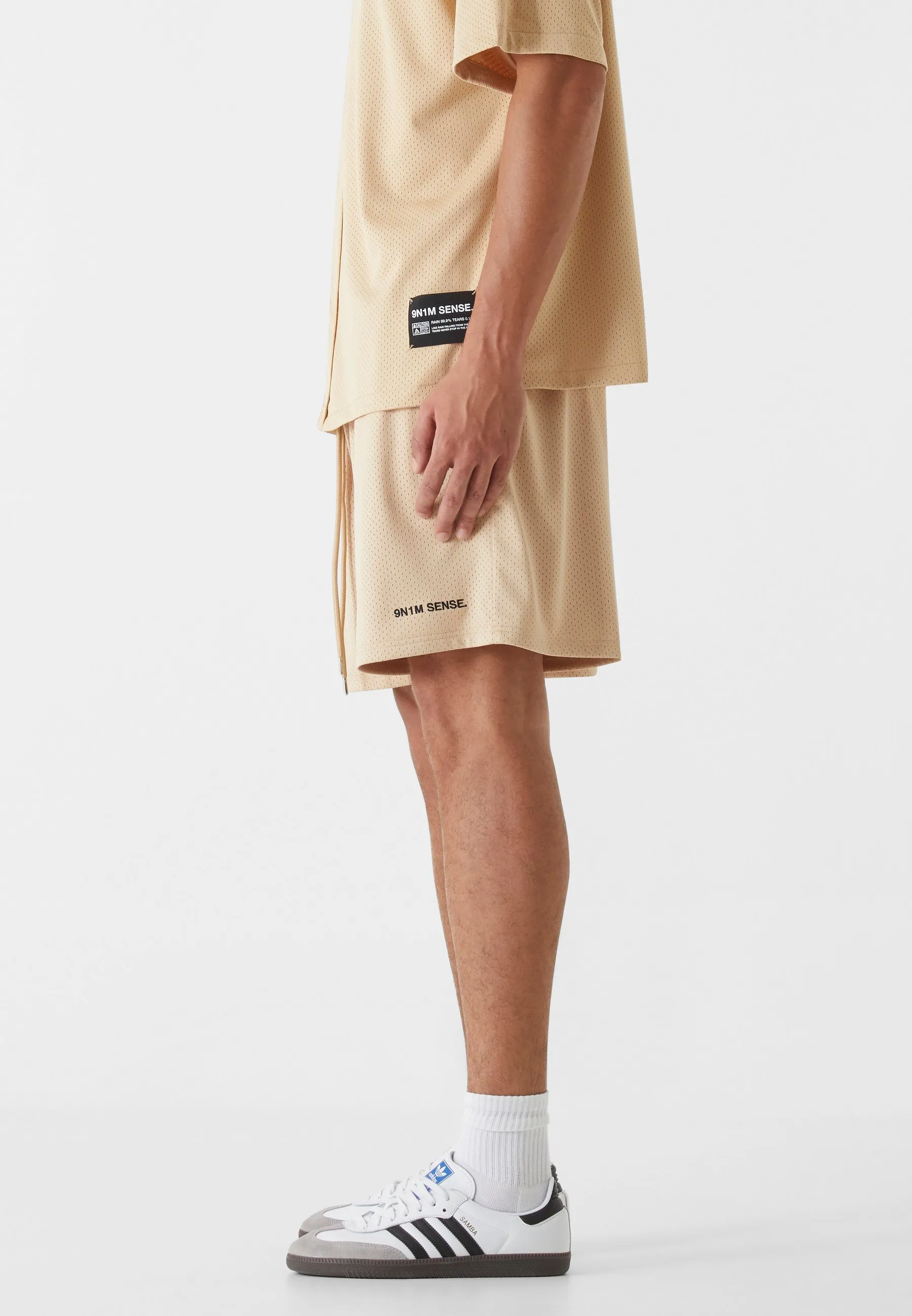 ESSENTIAL MESH SHORTS - Pantaloni sportivi
