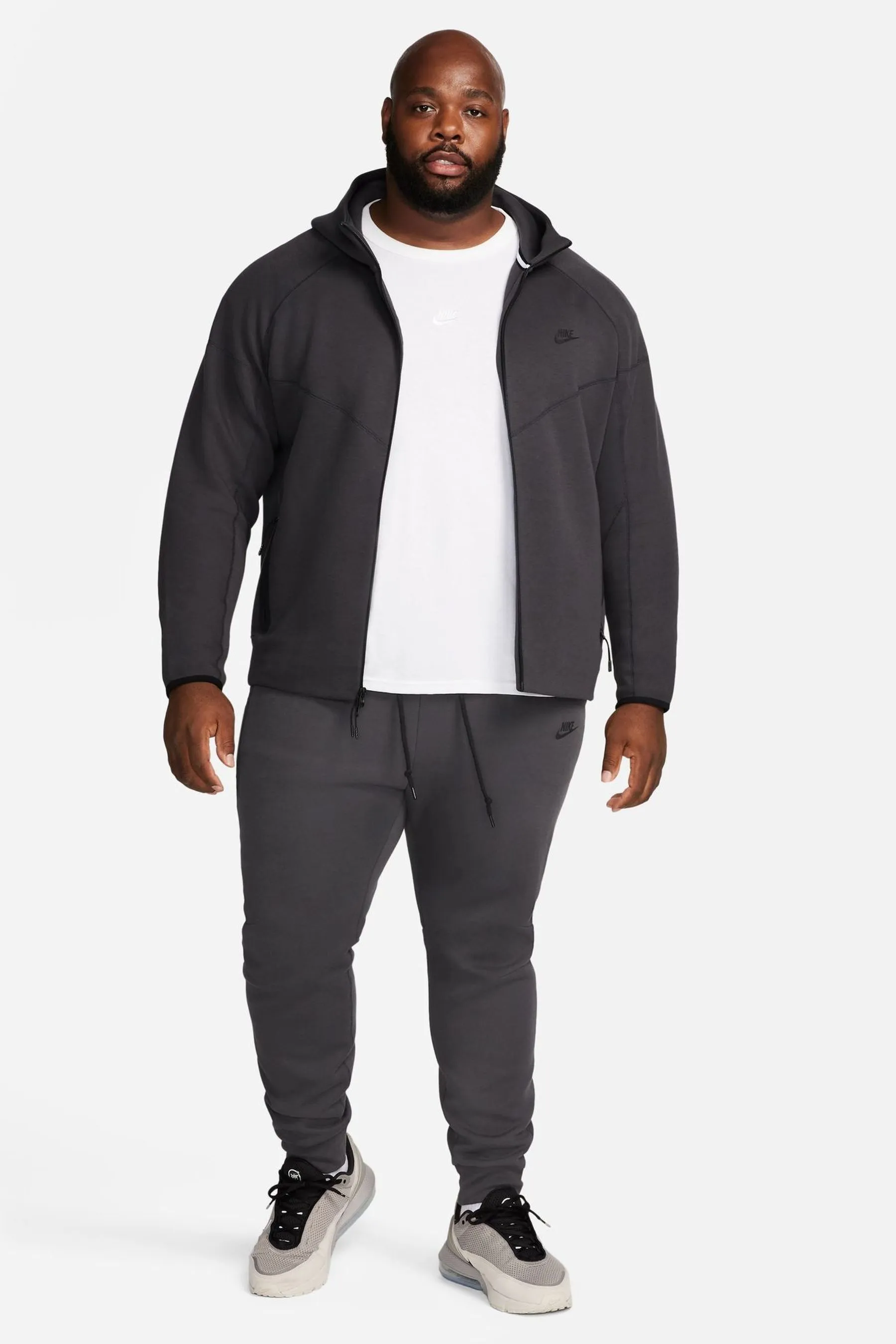 Nike - Pantaloni da jogging in tessuto tecnico e pile