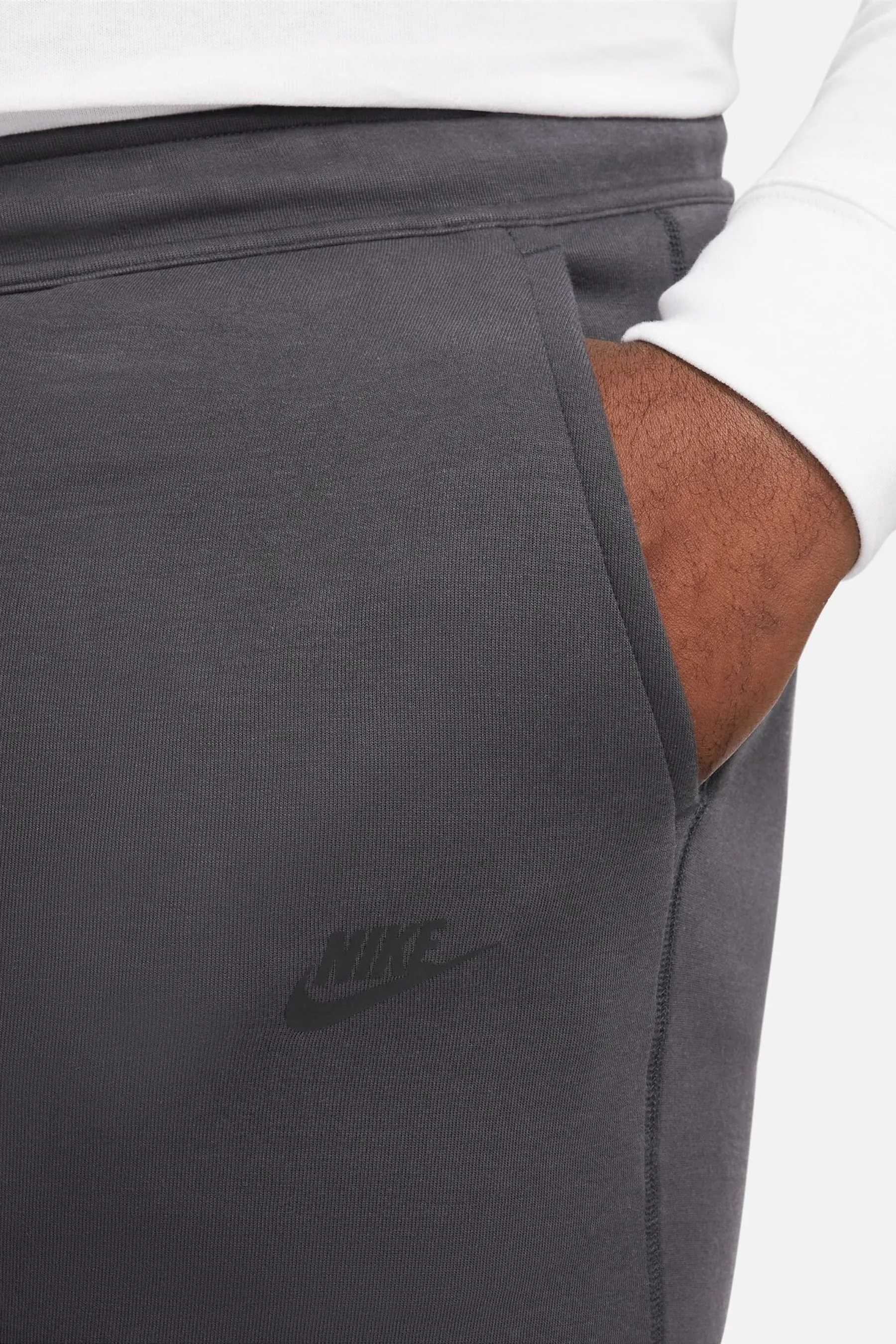 Nike - Pantaloni da jogging in tessuto tecnico e pile