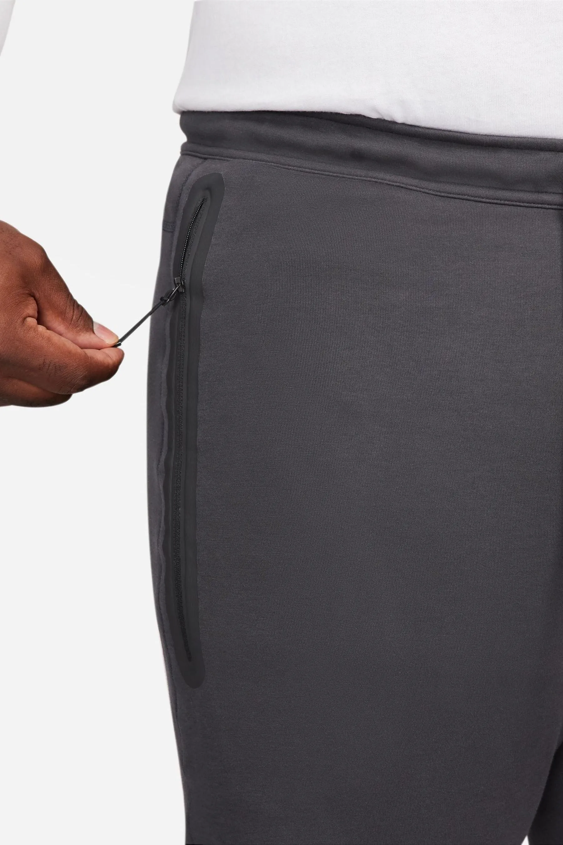 Nike - Pantaloni da jogging in tessuto tecnico e pile
