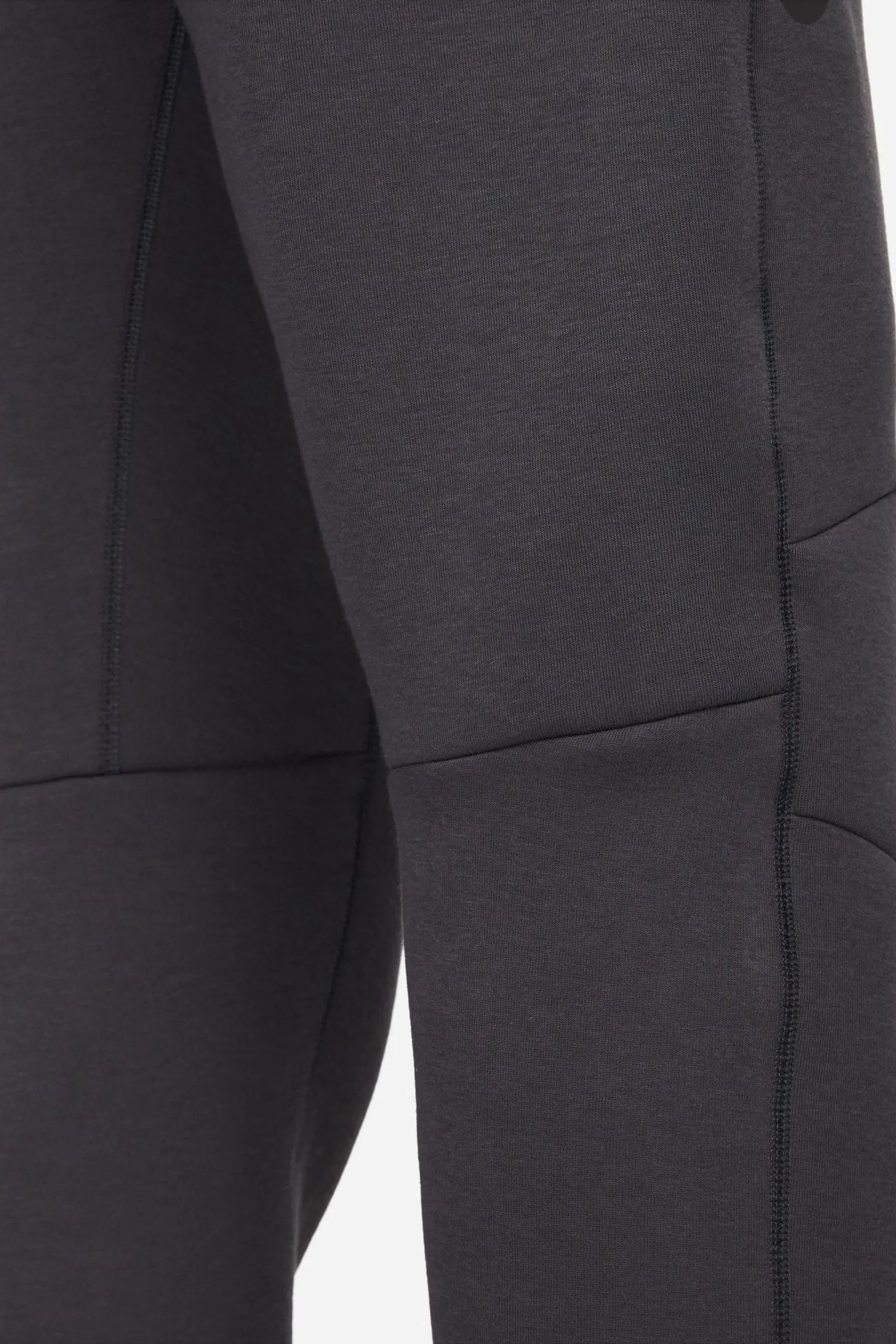 Nike - Pantaloni da jogging in tessuto tecnico e pile
