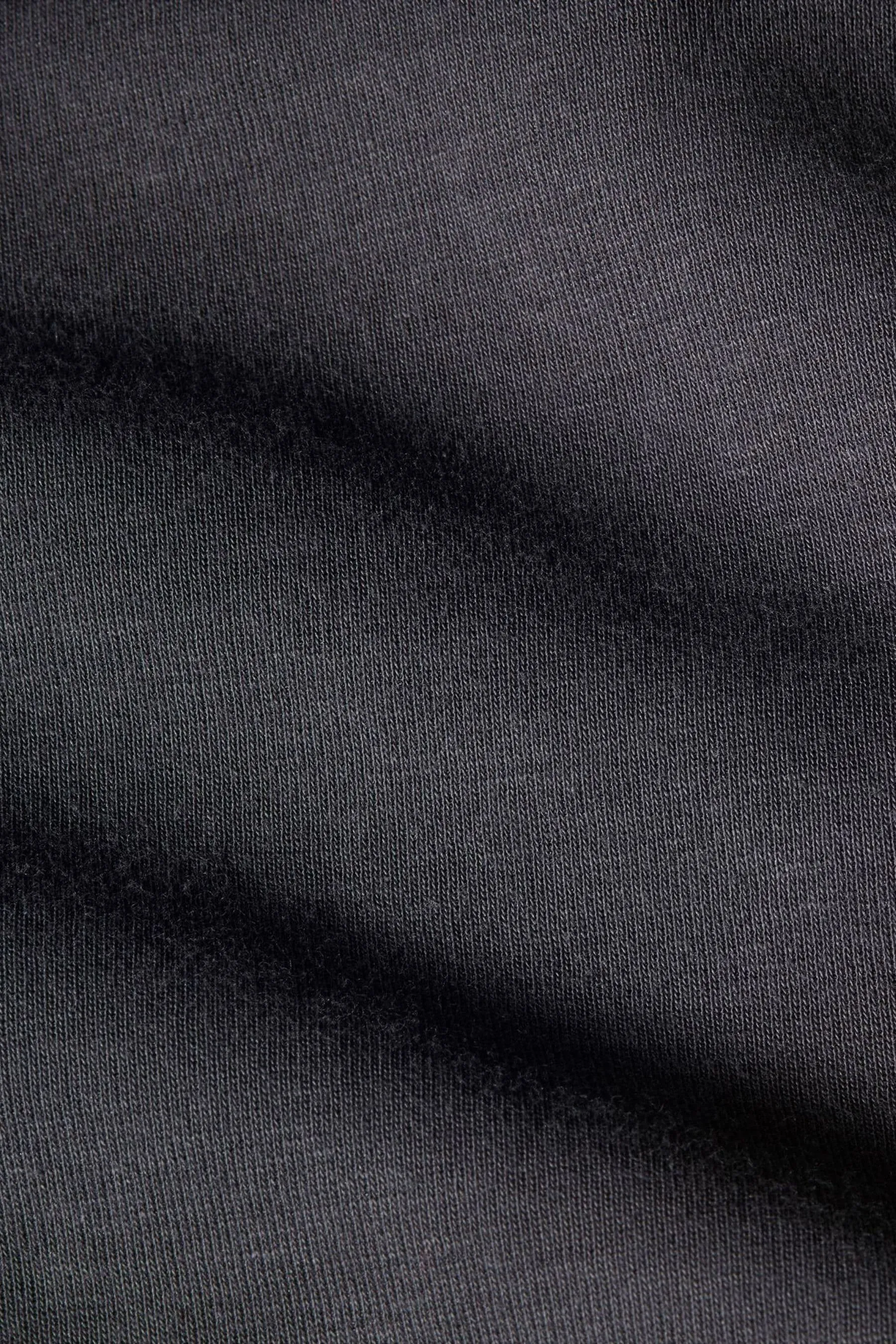 Nike - Pantaloni da jogging in tessuto tecnico e pile