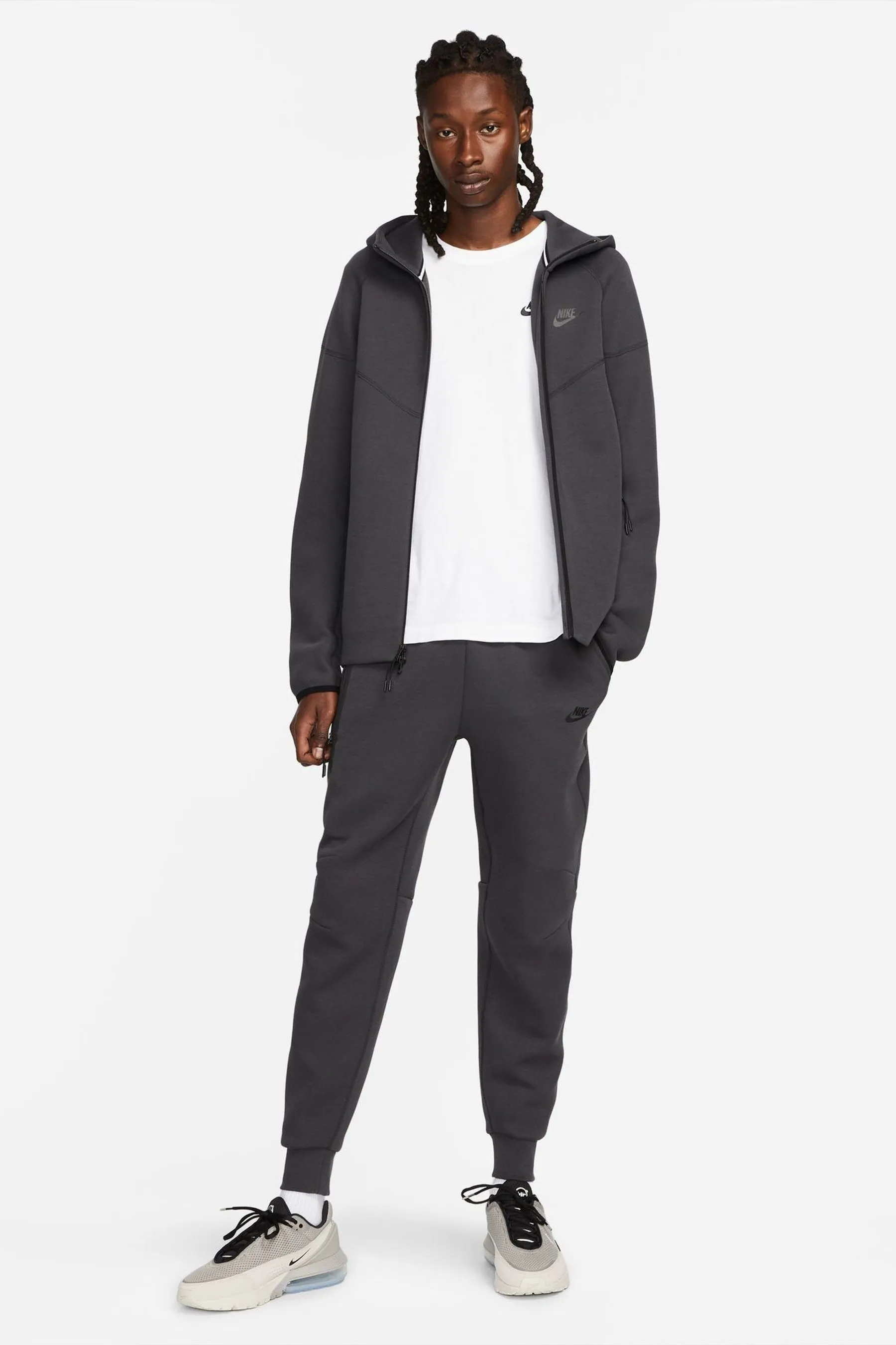 Nike - Pantaloni da jogging in tessuto tecnico e pile