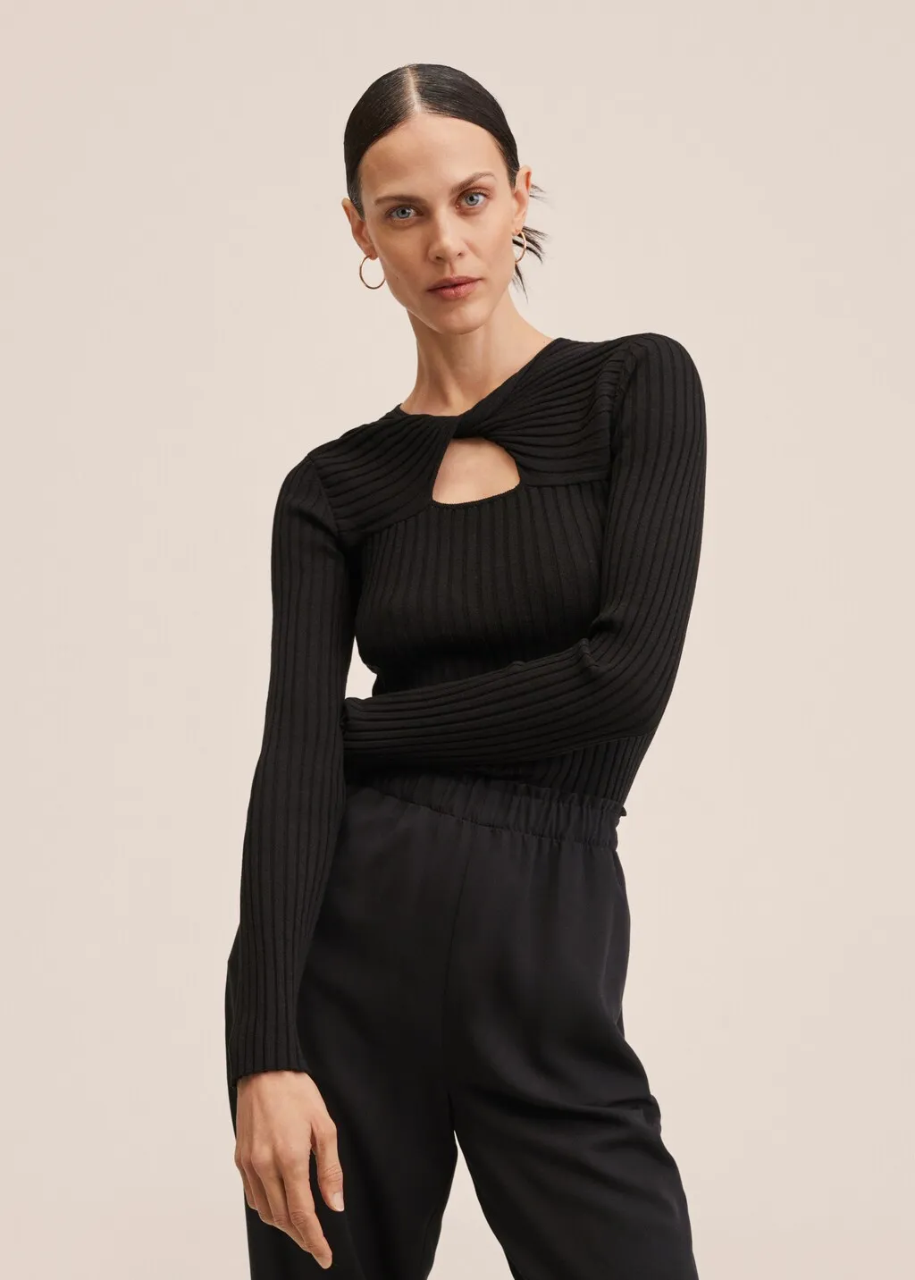 Pantaloni crop vita elasticizzata