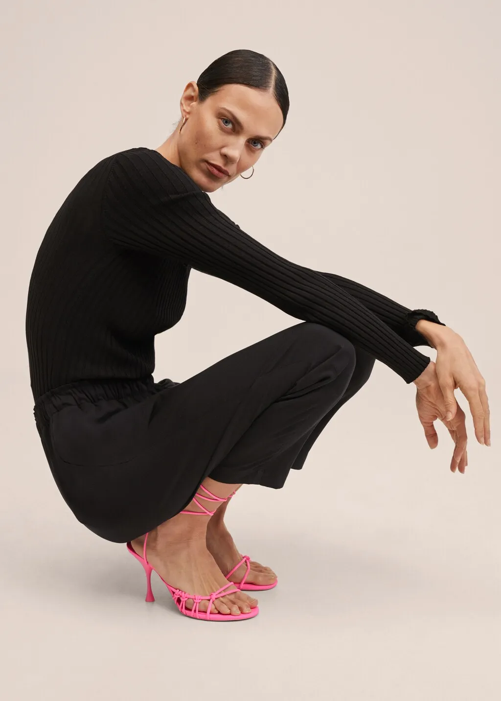 Pantaloni crop vita elasticizzata