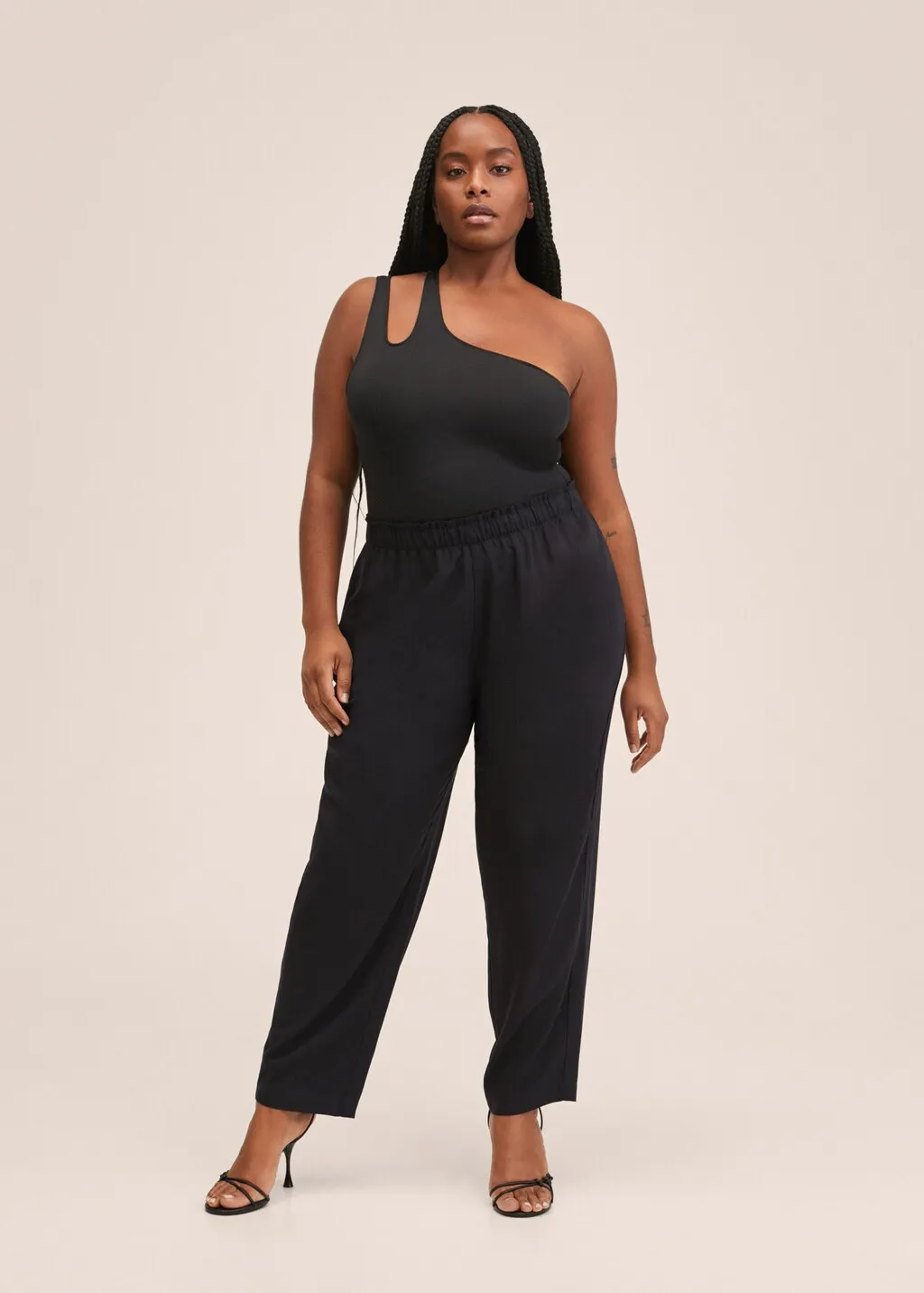 Pantaloni crop vita elasticizzata