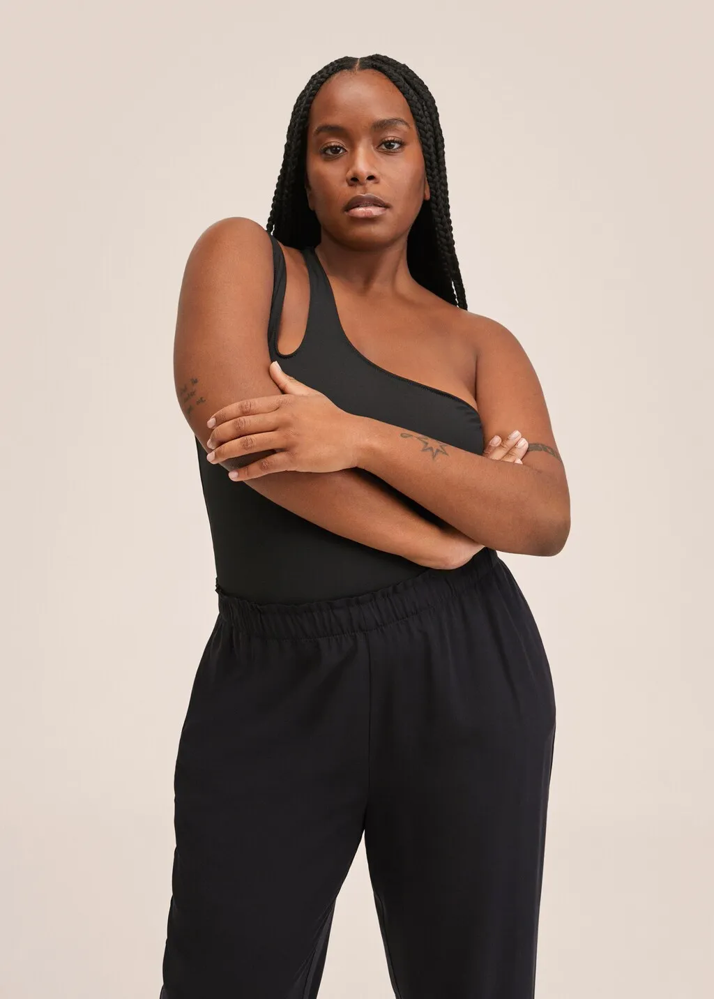 Pantaloni crop vita elasticizzata