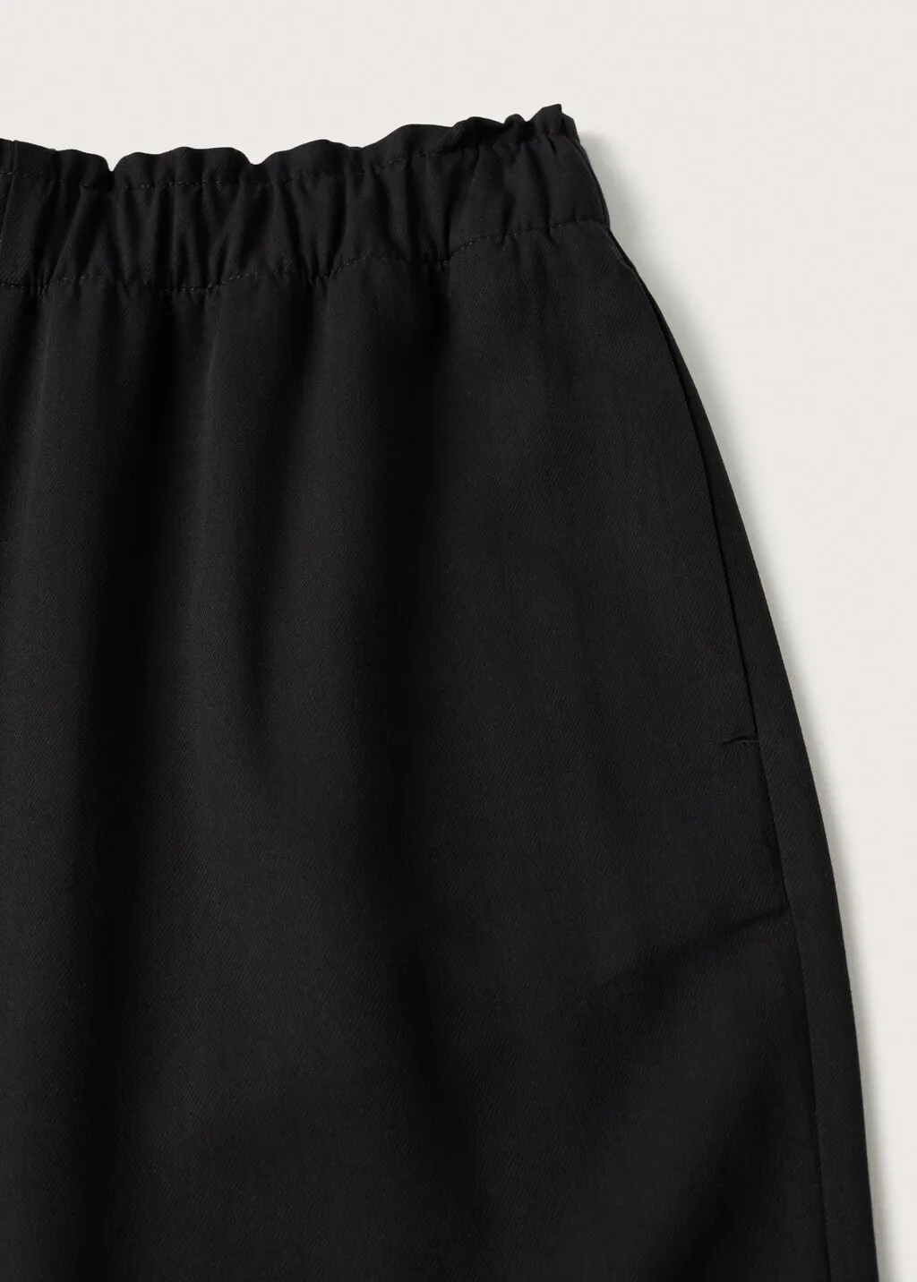 Pantaloni crop vita elasticizzata