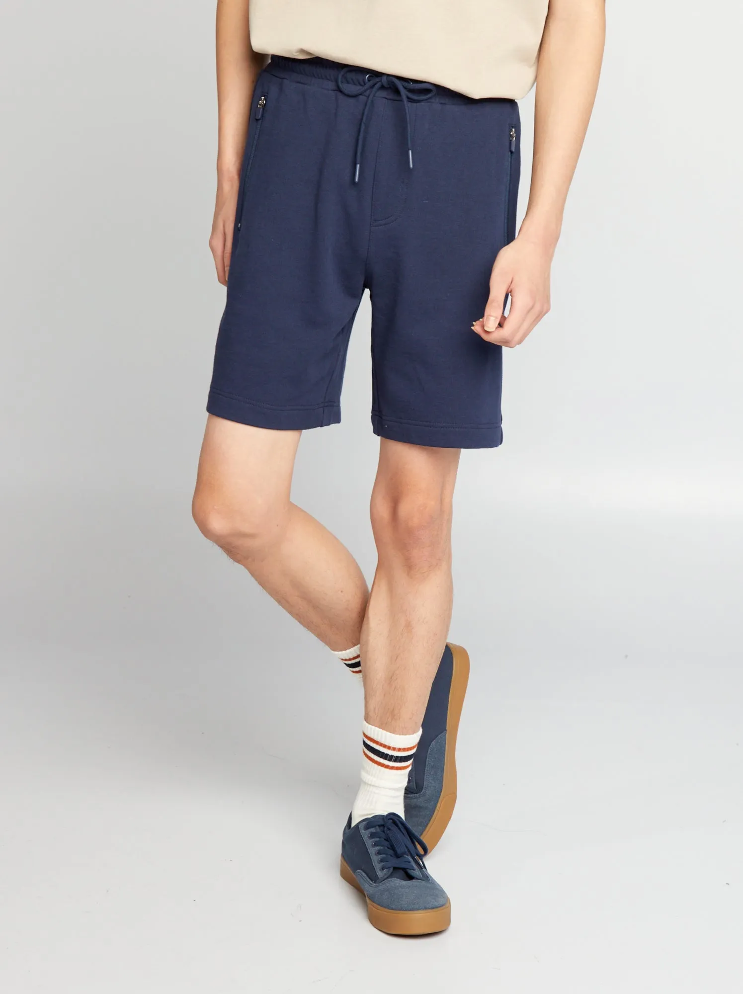 Shorts in tessuto felpato con tasche con zip - NERO
